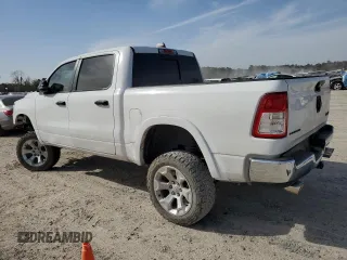 2023 Ram 1500 Limited with VIN 1C6SRFHT1PN576104, listed as a Copart auction lot 48064355 with 23,874 mi miles and Salvage title. Bid and sale history available at DreamBid. Image 2.