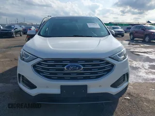 2020 Ford Edge Titanium z VIN 2FMPK3K98LBA42159, wystawiony jako IAAI lot #42358229 z przebiegiem 88 512 mil mil oraz . Historia ofert i sprzedaży dostępna na DreamBid. Obrazek 12.