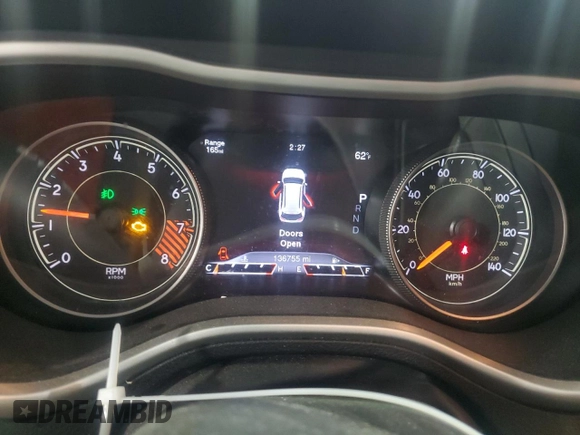 2015 Jeep Cherokee Trailhawk with VIN 1C4PJMBS5FW587545, listed as a Copart auction lot 58820685 with 136,755 mi miles and Salvage title. Bid and sale history available at DreamBid. Image 9.