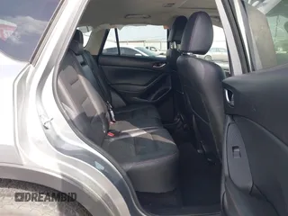 2014 Mazda CX-5 Grand Touring with VIN JM3KE4DY9E0375014, listed as a IAAI auction lot 42000382 with 110,584 mi miles and . Bid and sale history available at DreamBid. Image 8.
