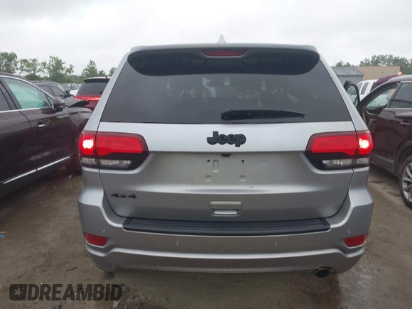 2018 Jeep Grand Cherokee Laredo E with VIN 1C4RJFAG6JC452859, listed as a IAAI auction lot 42647127 with 107,869 mi miles and . Bid and sale history available at DreamBid. Image 15.