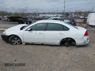 2014 Chevrolet Impala LS with VIN 2G1WA5E38E1141734, listed as a IAAI auction lot 41942551 with 110,805 mi miles and . Bid and sale history available at DreamBid. Image 14.