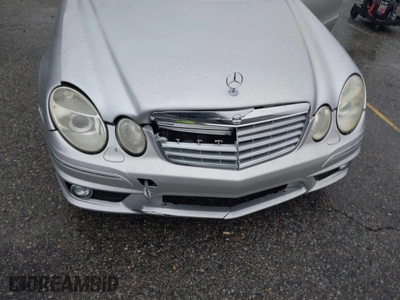 2003 Mercedes-Benz E-Class 5.5L AMG with VIN WDBUF76J93A351317, listed as a IAAI auction lot 41573446 with 144,119 mi miles. Bid and sale history available at carsss.com. Image 6.