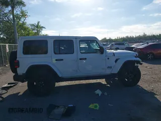 2020 Jeep Wrangler Unlimited Sahara High Altitude with VIN 1C4HJXEG7LW259911, listed as a IAAI auction lot 41786013 with 47,936 mi miles and . Bid and sale history available at DreamBid. Image 13.