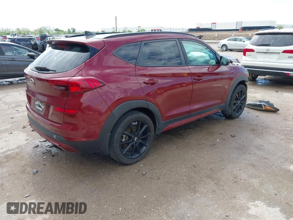 2019 Hyundai Tucson Sport z VIN KM8J33AL4KU928830, wystawiony jako IAAI lot #42104966 z przebiegiem 107 350 mil mil oraz . Historia ofert i sprzedaży dostępna na DreamBid. Obrazek 4.