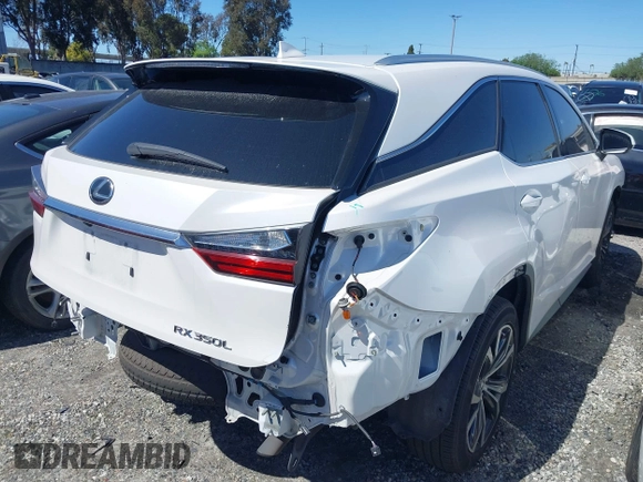 2018 Lexus RX with VIN JTJGZKCA0J2004007, listed as a IAAI auction lot 41382473 with 104,630 mi miles. Bid and sale history available at carsss.com. Image 4.
