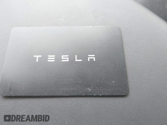 2023 Tesla Model 3 with VIN 5YJ3E1EA4PF644621, listed as a IAAI auction lot 42280312 with 41,262 mi miles and . Bid and sale history available at DreamBid. Image 11.