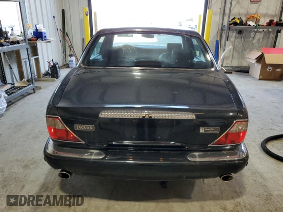 2001 Jaguar XJ with VIN SAJDA25B01MF26440, listed as a Copart auction lot 83933224 with 124,873 mi miles and Clean Title. Bid and sale history available at DreamBid. Image 6.