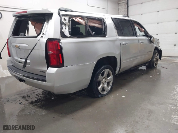 2017 Chevrolet Suburban Premier with VIN 1GNSKJKC0HR179235, listed as a IAAI auction lot 41301181 with 131,698 mi miles. Bid and sale history available at carsss.com. Image 4.