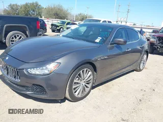 2015 Maserati Ghibli z VIN ZAM57XSA6F1153481, wystawiony jako IAAI lot #41694942 z przebiegiem 74 027 mil mil oraz . Historia ofert i sprzedaży dostępna na DreamBid. Obrazek 2.