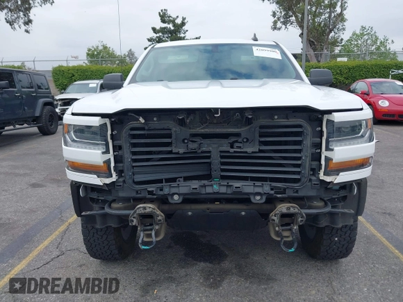 2018 Chevrolet Silverado 1500 Custom with VIN 1GCRCPEH6JZ274743, listed as a IAAI auction lot 42099900 with 61,008 mi miles and . Bid and sale history available at DreamBid. Image 13.