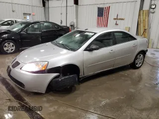 2009 Pontiac G6 1SA z VIN 1G2ZG57B294112235, wystawiony jako Copart lot #86734174 z przebiegiem 111 612 mil mil oraz Nie do naprawy. Historia ofert i sprzedaży dostępna na DreamBid. Obrazek 1.