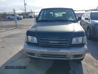 2000 Isuzu Trooper S z VIN JACDS58X9Y7J08094, wystawiony jako IAAI lot #41818546 z przebiegiem 154 927 mil mil oraz . Historia ofert i sprzedaży dostępna na DreamBid. Obrazek 17.