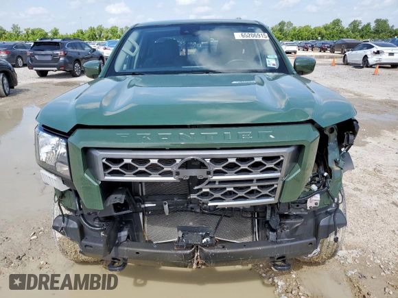 2022 Nissan Frontier Pro-4X with VIN 1N6ED1EK5NN691351, listed as a Copart auction lot 65206915 with 64,610 mi miles and Salvage title. Bid and sale history available at DreamBid. Image 5.