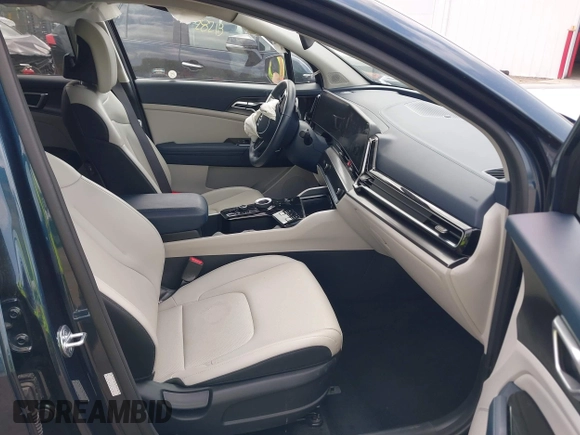 2023 Kia Sportage EX with VIN KNDPVCAGXP7104090, listed as a IAAI auction lot 42144158 with 26,983 mi miles and . Bid and sale history available at DreamBid. Image 5.