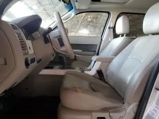 2009 Mercury Mariner Premier with VIN 4M2CU87789KJ11460, listed as a Copart auction lot 51702805 with 191,497 mi miles and Clean Title. Bid and sale history available at carsss.com. Image 7.