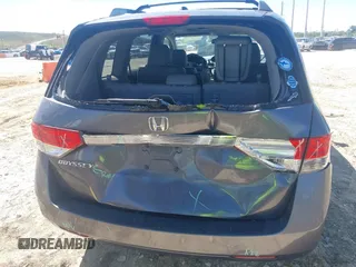 2015 Honda Odyssey EX-L with VIN 5FNRL5H61FB048170, listed as a IAAI auction lot 41822798 with 179,550 mi miles and . Bid and sale history available at DreamBid. Image 6.