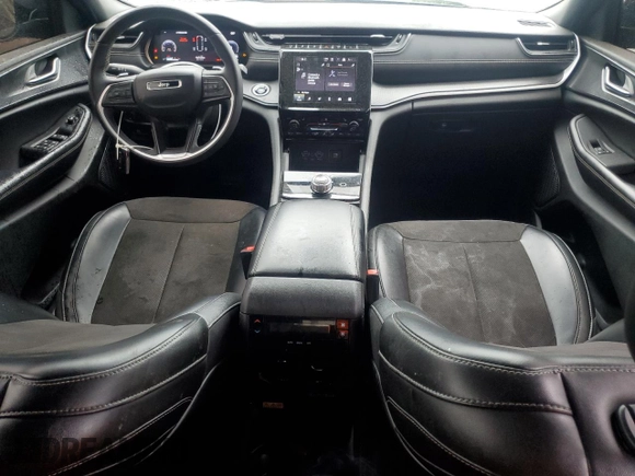 2023 Jeep Grand Cherokee Laredo with VIN 1C4RJKAG9P8829088, listed as a Copart auction lot 60099345 with 83,319 mi miles and Salvage title. Bid and sale history available at DreamBid. Image 8.