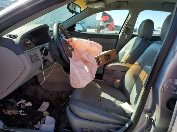 2005 Buick LaCrosse CXS with VIN 2G4WE567651225267, listed as a Copart auction lot 46548115 with 178,028 mi miles and Salvage Title. Bid and sale history available at carsss.com. Image 7.