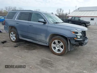 2015 Chevrolet Tahoe LT with VIN 1GNSKBKCXFR672195, listed as a IAAI auction lot 42008672 with 176,493 mi miles and . Bid and sale history available at DreamBid. Image 1.