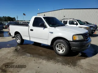 2001 Ford F-150 XL z VIN 1FTZF17231NA07581, wystawiony jako Copart lot #50421255 z przebiegiem 316 753 mil mil oraz Szkoda całkowita • Salvage title. Historia ofert i sprzedaży dostępna na DreamBid. Obrazek 4.