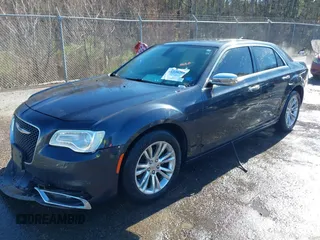 2016 Chrysler 300 with VIN 2C3CCAEG1GH320292, listed as a IAAI auction lot 41220208 with 125,762 mi miles. Bid and sale history available at carsss.com. Image 2.
