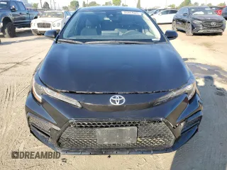 2021 Toyota Corolla LE with VIN JTDEPMAE0MJ150807, listed as a Copart auction lot 46947665 with 143,869 mi miles and Salvage Title. Bid and sale history available at carsss.com. Image 5.