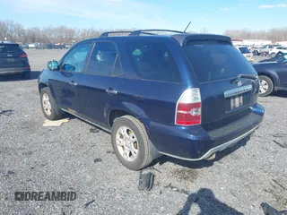 2004 Acura MDX Touring Pkg w/Navigation with VIN 2HNYD18834H523502, listed as a IAAI auction lot 41876131 with 150,886 mi miles. Bid and sale history available at carsss.com. Image 3.