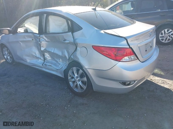 2014 Hyundai Accent GLS with VIN KMHCU4AE3EU603930, listed as a IAAI auction lot 41748640 with 269,813 mi miles. Bid and sale history available at carsss.com. Image 3.