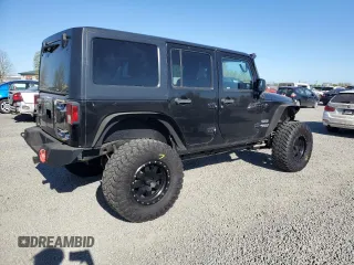 2014 Jeep Wrangler Unlimited Sport with VIN 1C4BJWDG1EL308834, listed as a Copart auction lot 53710065 with 127,612 mi miles and Clean Title. Bid and sale history available at DreamBid. Image 3.