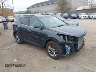 2017 Hyundai Santa Fe 2.4L z VIN 5NMZUDLB5HH034575, wystawiony jako IAAI lot #40970070 z przebiegiem 64 274 mil mil oraz . Historia ofert i sprzedaży dostępna na DreamBid. Obrazek 1.
