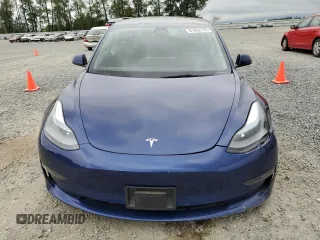 2023 Tesla Model 3 with VIN 5YJ3E1EA7PF450973, listed as a Copart auction lot 61082175 with 47,029 mi miles and Salvage title. Bid and sale history available at DreamBid. Image 5.