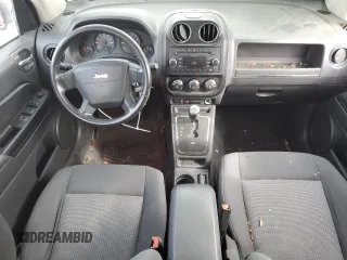 2010 Jeep Compass Sport with VIN 1J4NF4FB2AD525117, listed as a Copart auction lot 79426624 with 149,152 mi miles and Salvage Title. Bid and sale history available at carsss.com. Image 8.