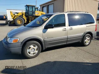 2000 Pontiac Montana z VIN 1GMDU23E1YD161191, wystawiony jako Copart lot #75875084 z przebiegiem 127 983 mil mil oraz Szkoda całkowita • Salvage title. Historia ofert i sprzedaży dostępna na DreamBid. Obrazek 1.