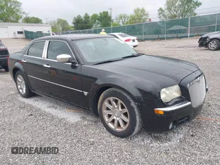2005 Chrysler 300 with VIN 2C3JA63H05H608145, listed as a IAAI auction lot 42075474 with 167,098 mi miles. Bid and sale history available at carsss.com. Image 1.