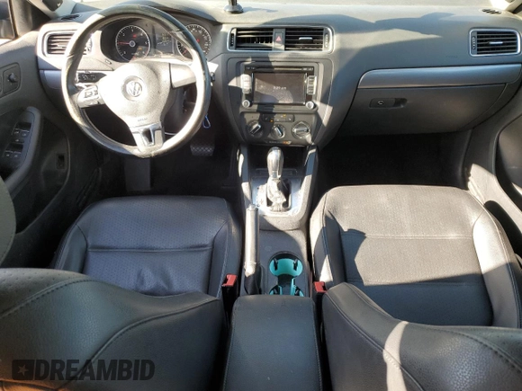 2014 Volkswagen Jetta TDI w/Premium z VIN 3VWLL7AJ8EM385667, wystawiony jako Copart lot #57804065 z przebiegiem 122 020 mil mil oraz Szkoda całkowita • Salvage title. Historia ofert i sprzedaży dostępna na DreamBid. Obrazek 8.
