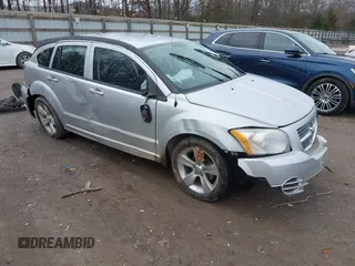 2010 Dodge Caliber SXT z VIN 1B3CB4HA1AD663892, wystawiony jako IAAI lot #41535071 z przebiegiem 186 900 mil mil oraz . Historia ofert i sprzedaży dostępna na DreamBid. Obrazek 1.