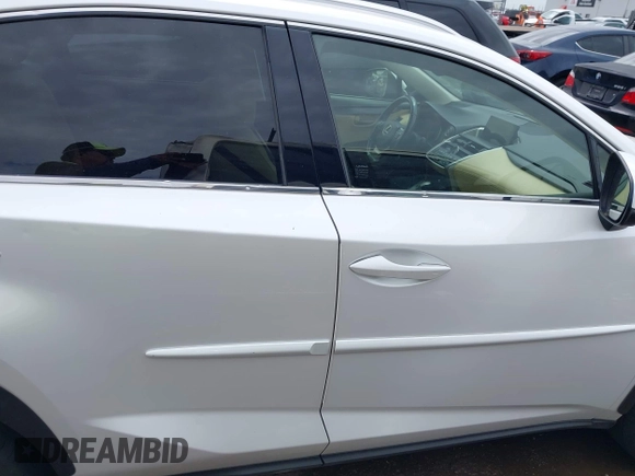 2016 Lexus NX 200t with VIN JTJBARBZ7G2082097, listed as a IAAI auction lot 42596163 with 122,006 mi miles and . Bid and sale history available at DreamBid. Image 13.