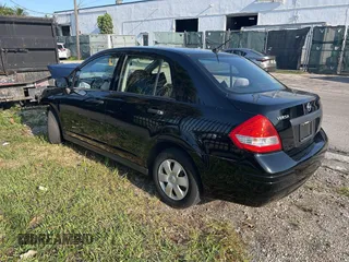 2010 Nissan Versa 1.6 with VIN 3N1CC1AP5AL391286, listed as a IAAI auction lot 42005172 with 33,441 mi miles. Bid and sale history available at carsss.com. Image 3.