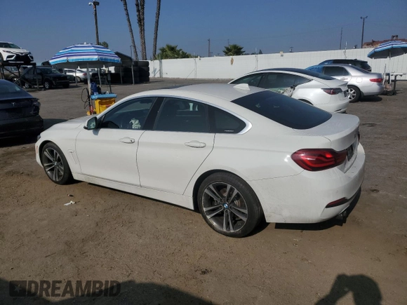 2020 BMW 4 Series 430i with VIN WBA4J1C01LBU67532, listed as a Copart auction lot 83257984 with 68,664 mi miles and Salvage Title. Bid and sale history available at DreamBid. Image 2.