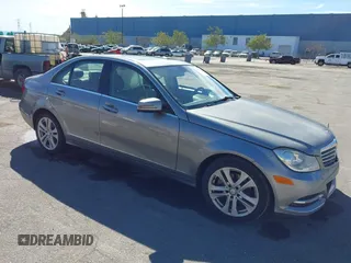 2014 Mercedes-Benz C-Class C 250 Sport with VIN WDDGF4HB1EA956833, listed as a IAAI auction lot 41648289 with 128,082 mi miles. Bid and sale history available at carsss.com. Image 1.