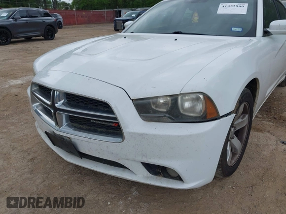 2014 Dodge Charger SE with VIN 2C3CDXBG4EH186881, listed as a IAAI auction lot 41952966 with 206,057 mi miles and . Bid and sale history available at DreamBid. Image 6.