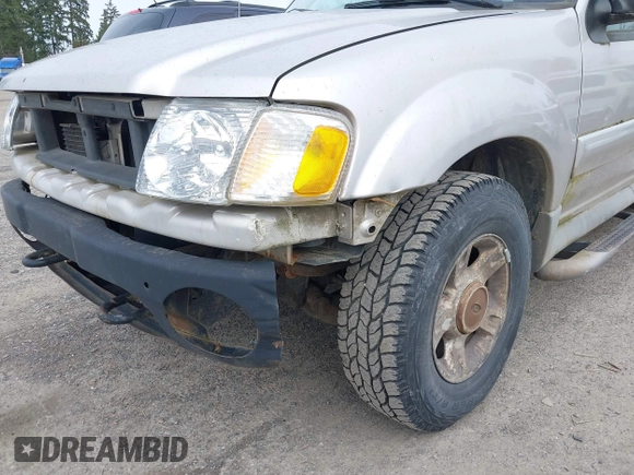 2003 Ford Explorer Sport Trac XLS z VIN 1FMZU77E93UA38468, wystawiony jako IAAI lot #41667956 z przebiegiem 291 806 mil mil oraz . Historia ofert i sprzedaży dostępna na DreamBid. Obrazek 6.