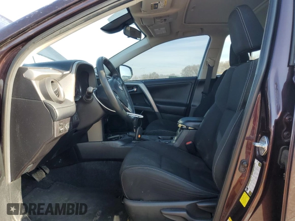 2018 Toyota RAV4 XLE with VIN 2T3WFREVXJW461897, listed as a Copart auction lot 48459355 with 159,479 mi miles and Salvage Title. Bid and sale history available at DreamBid. Image 7.