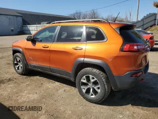 2015 Jeep Cherokee Trailhawk with VIN 1C4PJMBS0FW604168, listed as a Copart auction lot 51470625 with 186,211 mi miles and Salvage Title. Bid and sale history available at carsss.com. Image 2.