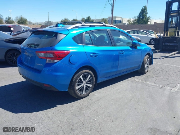 2022 Subaru Impreza Premium with VIN 4S3GTAD60N3721158, listed as a IAAI auction lot 41802241 with 12,971 mi miles. Bid and sale history available at carsss.com. Image 4.