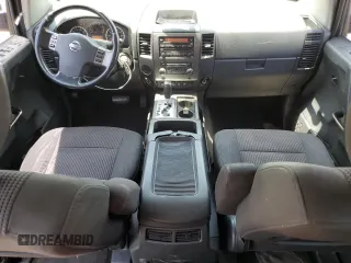 2012 Nissan Titan SV with VIN 1N6BA0ED1CN323589, listed as a Copart auction lot 62068904 with 148,354 mi miles and Salvage Title. Bid and sale history available at DreamBid. Image 8.