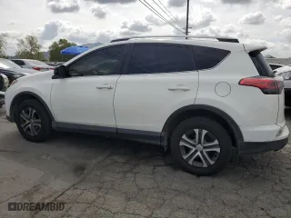 2018 Toyota RAV4 LE with VIN JTMBFREV9JD256759, listed as a Copart auction lot 51165835 with 128,253 mi miles and Salvage Title. Bid and sale history available at carsss.com. Image 2.