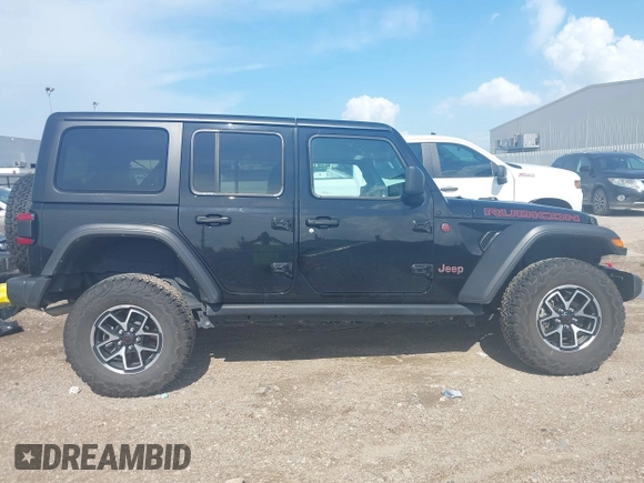 2024 Jeep Wrangler Rubicon with VIN 1C4PJXFG0RW271322, listed as a IAAI auction lot 42736647 with 32,319 mi miles and . Bid and sale history available at DreamBid. Image 13.