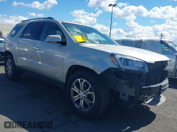 2014 GMC Acadia SLT z VIN 1GKKRSKD2EJ141913, wystawiony jako IAAI lot #41738536 z przebiegiem 100 577 mil mil oraz . Historia ofert i sprzedaży dostępna na DreamBid. Obrazek 1.